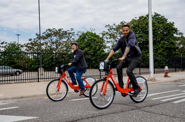 A row of MoGo bike share bicycles at a docking station in Detroit