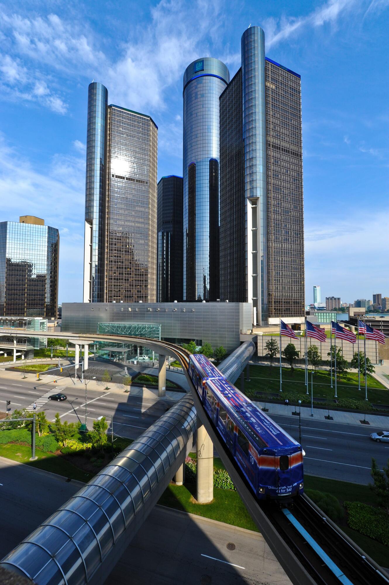 A Detroit People Mover train passing the GM Renaissance Center